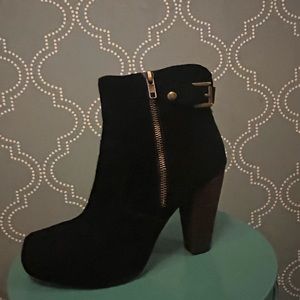 Black platform heeled ankle boots